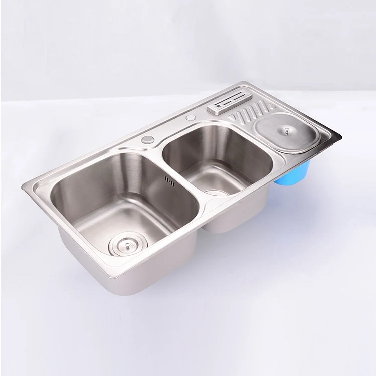 Double bowl kitchen sink with knife and  soap holder aside